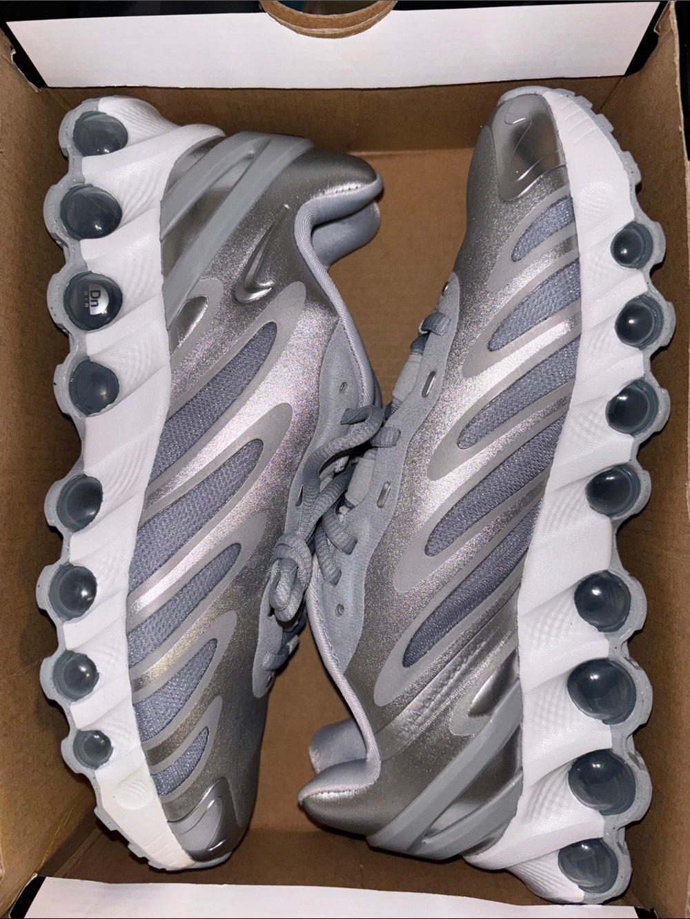 Nike Women's Metallic Silver and White Athletic Sneakers